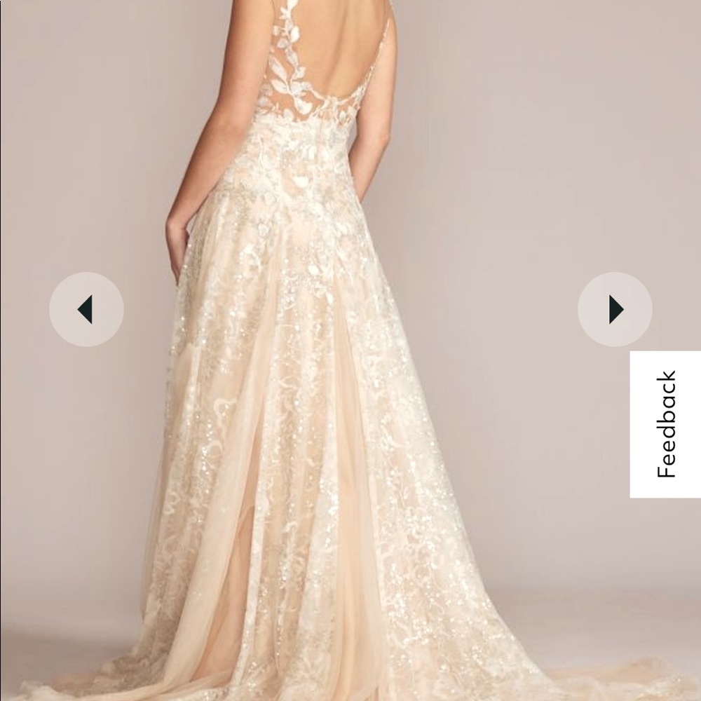 GALINA SIGNATURE- illusion embellished drop waist wedding gown

STYLE# SWG917